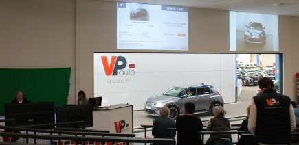 Voitures électriques à prix cassés : on a assisté à la première vente aux enchères en France